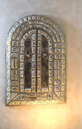 Amazingly detailed metal and bone mirror