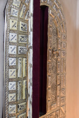 Amazingly detailed metal and bone mirror