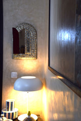 Amazingly detailed metal and bone mirror