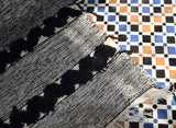 Zanafi Rug in Grey with unique Black accents