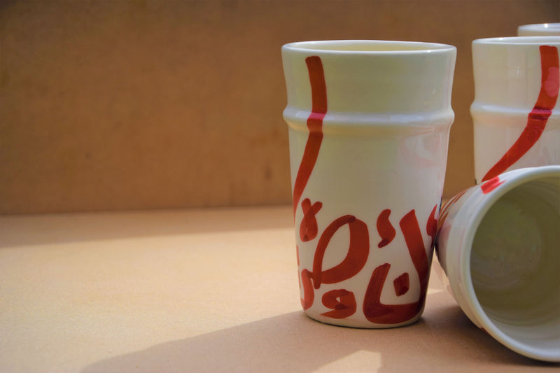 A set of six Beldi Cups decorated with Arabic Calligraphy