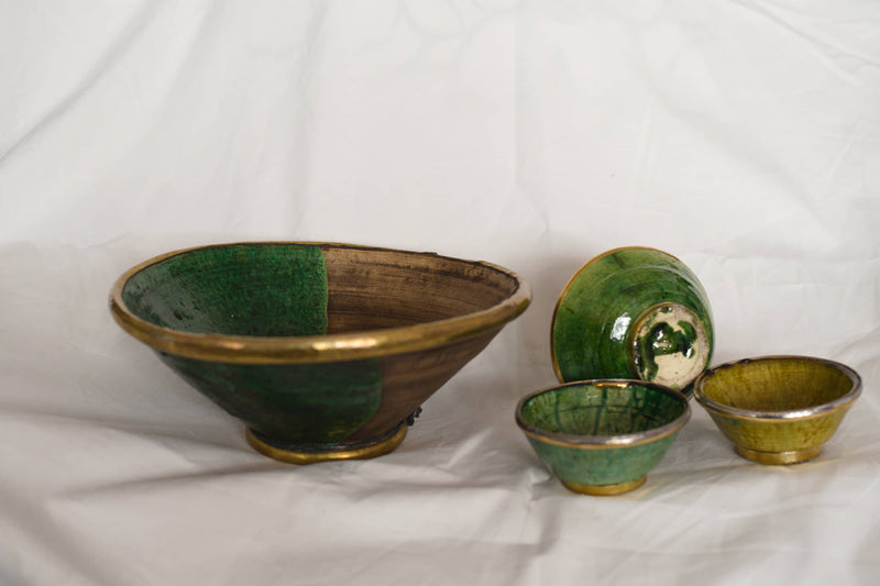 A set of four Green & Brown Tamegrout Bowls