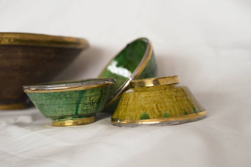 A set of four Green & Brown Tamegrout Bowls