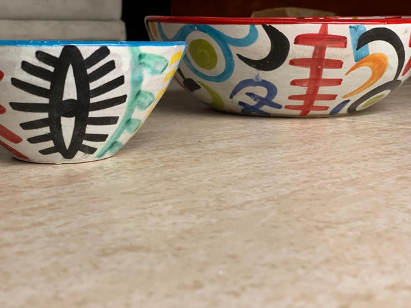 A set of two Naive Art Bowls and a Plate