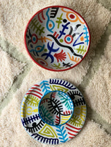 A set of two Naive Art Bowls and a Plate
