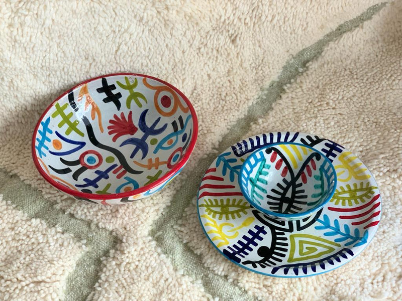 A set of two Naive Art Bowls and a Plate