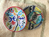 A set of two Naive Art Bowls and a Plate