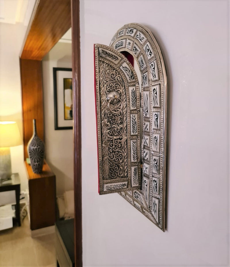 Amazingly detailed metal and bone mirror
