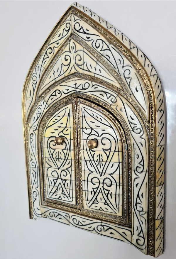 Exquisite brass and bone mirror
